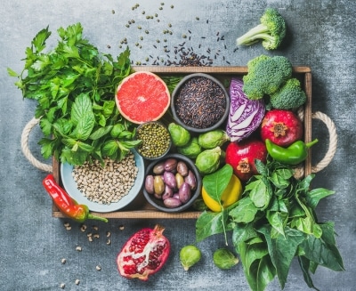 Fresh vegetables and leafy greens on a table