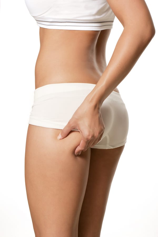 Woman showing a slim waistline