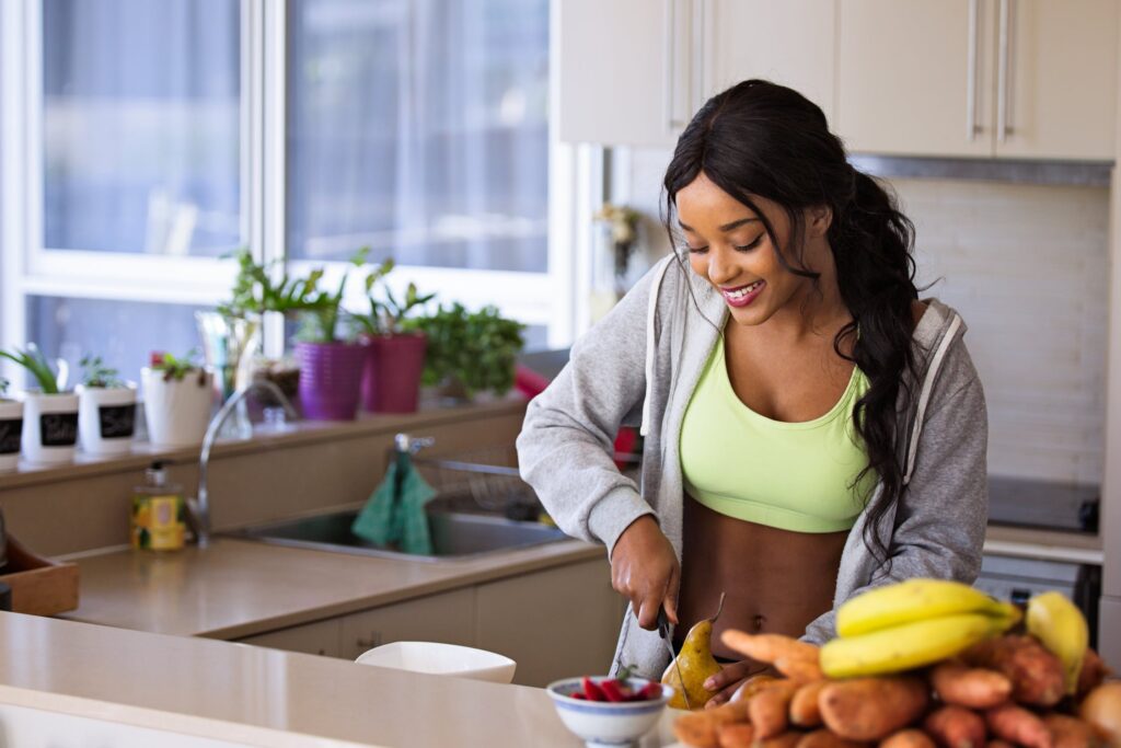 Woman preparing fresh vegetables in a kitchen