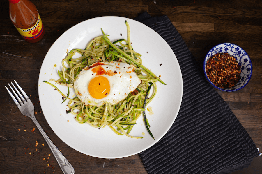 Pesto zoodles with a fried egg