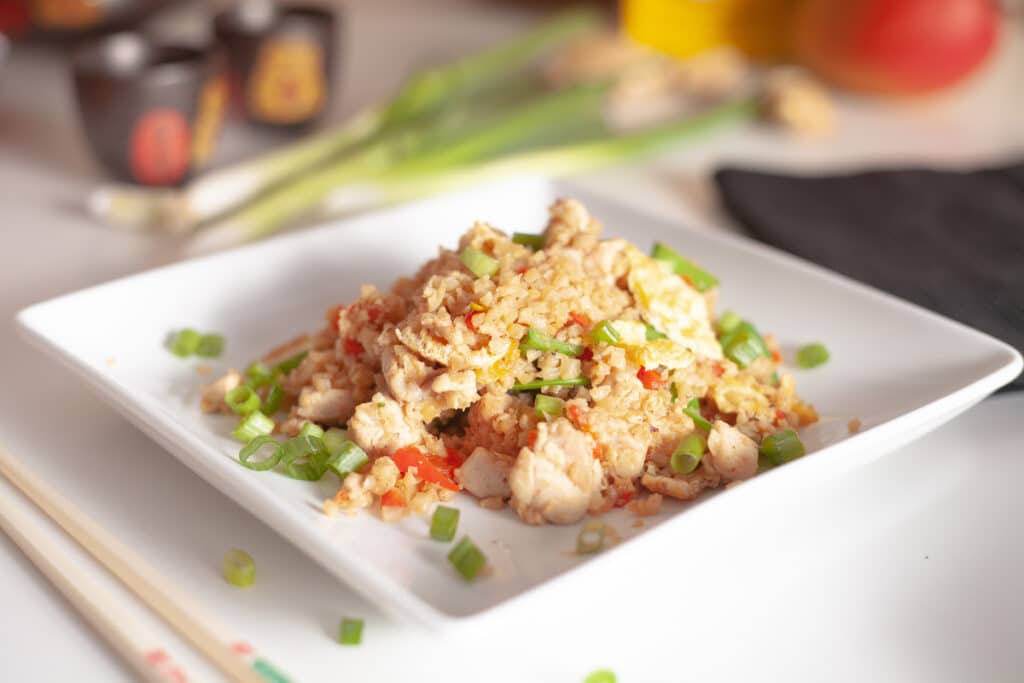 Low carb cauliflower fried rice with chicken and snow peas